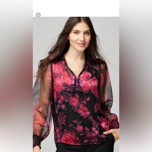 White House Black Market Black Burnout Romantic Top. Sheer sleeves create an eke